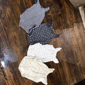 Set of 4 newborn onesies